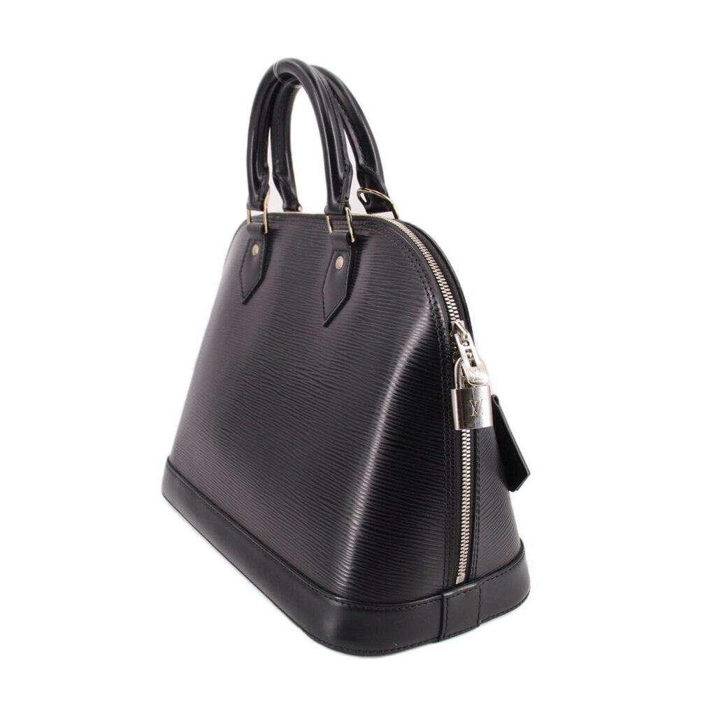 Black structured leather dome bag with top handles and side zipper pocket detail.