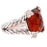 David Yurman sterling silver ring with twisted band and faceted red garnet