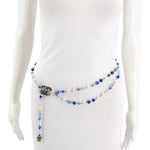 Long beaded belt worn at the waist, with a jeweled side accent and hanging end