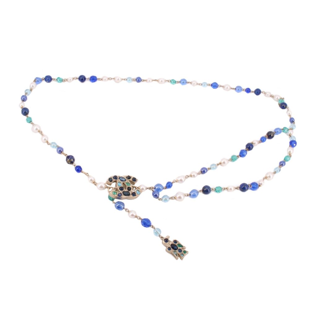Long beaded belt with blue, turquoise, and white beads and jeweled gold-tone accents