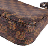 Louis Vuitton Damier Ebene corner detail with dark check pattern and rounded trim
