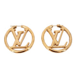 LOUIS VUITTON gold hoop earrings with LV monogram center, hinged backs.