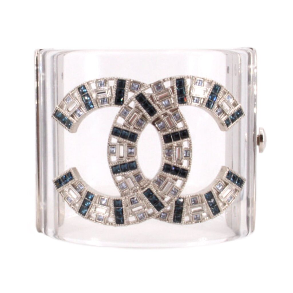CHANEL clear cuff bracelet with interlocking logo and blue, black, and clear jeweled accents