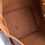 Louis Vuitton Petit Noe monogram shoulder bag with tan leather edge and stitching