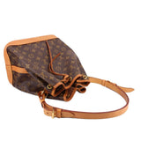 Louis Vuitton Petit Noe monogram shoulder bag with tan crossbody strap and drawstring ties