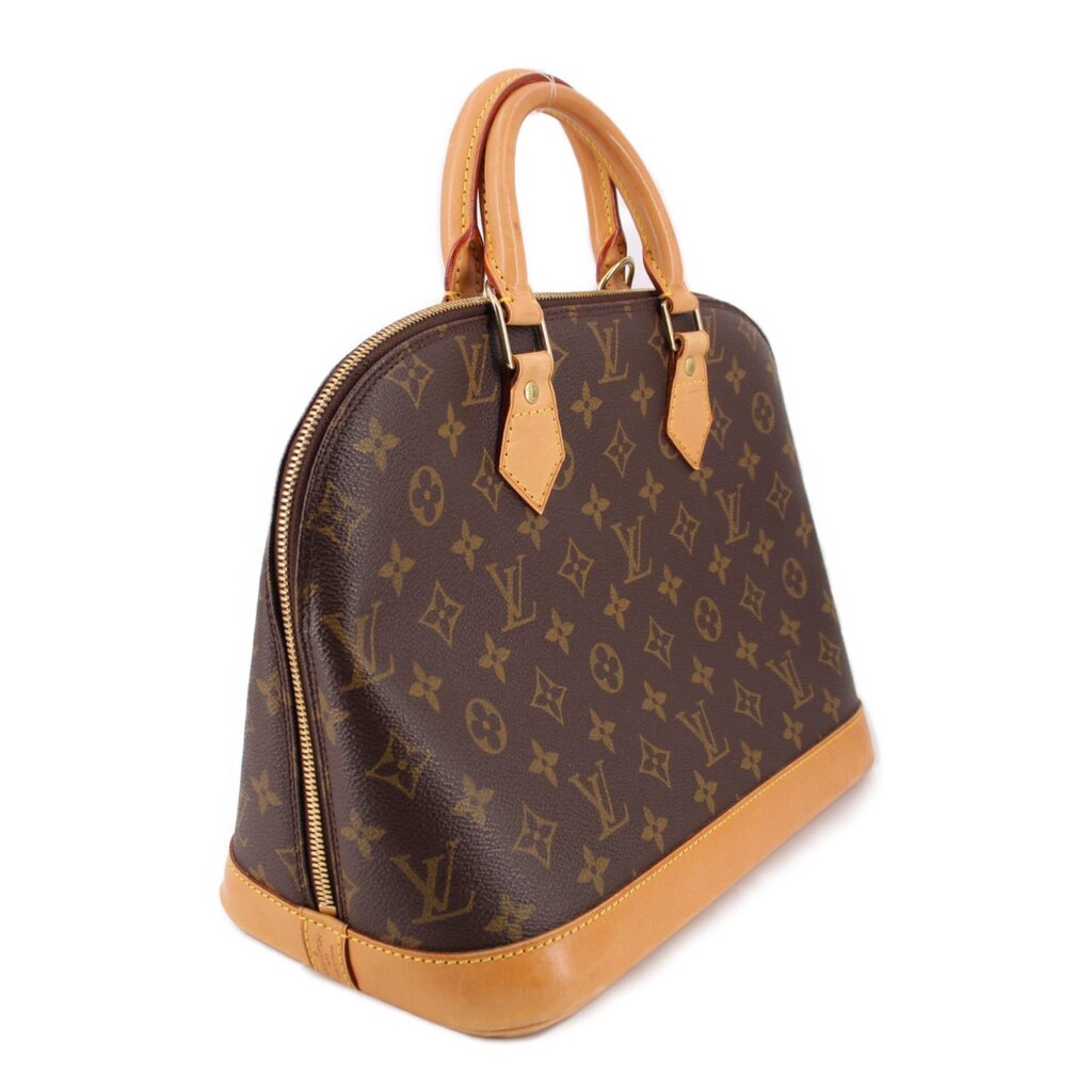 Monogram tote-style handle bag with tan leather trim and side zip pocket