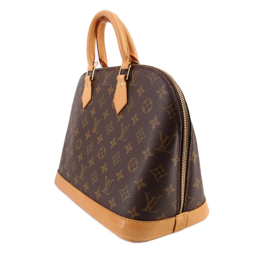 Monogram handle bag with tan leather bottom edge and side zipper detail