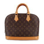 Monogram handle bag with tan leather bottom panel and double top handles