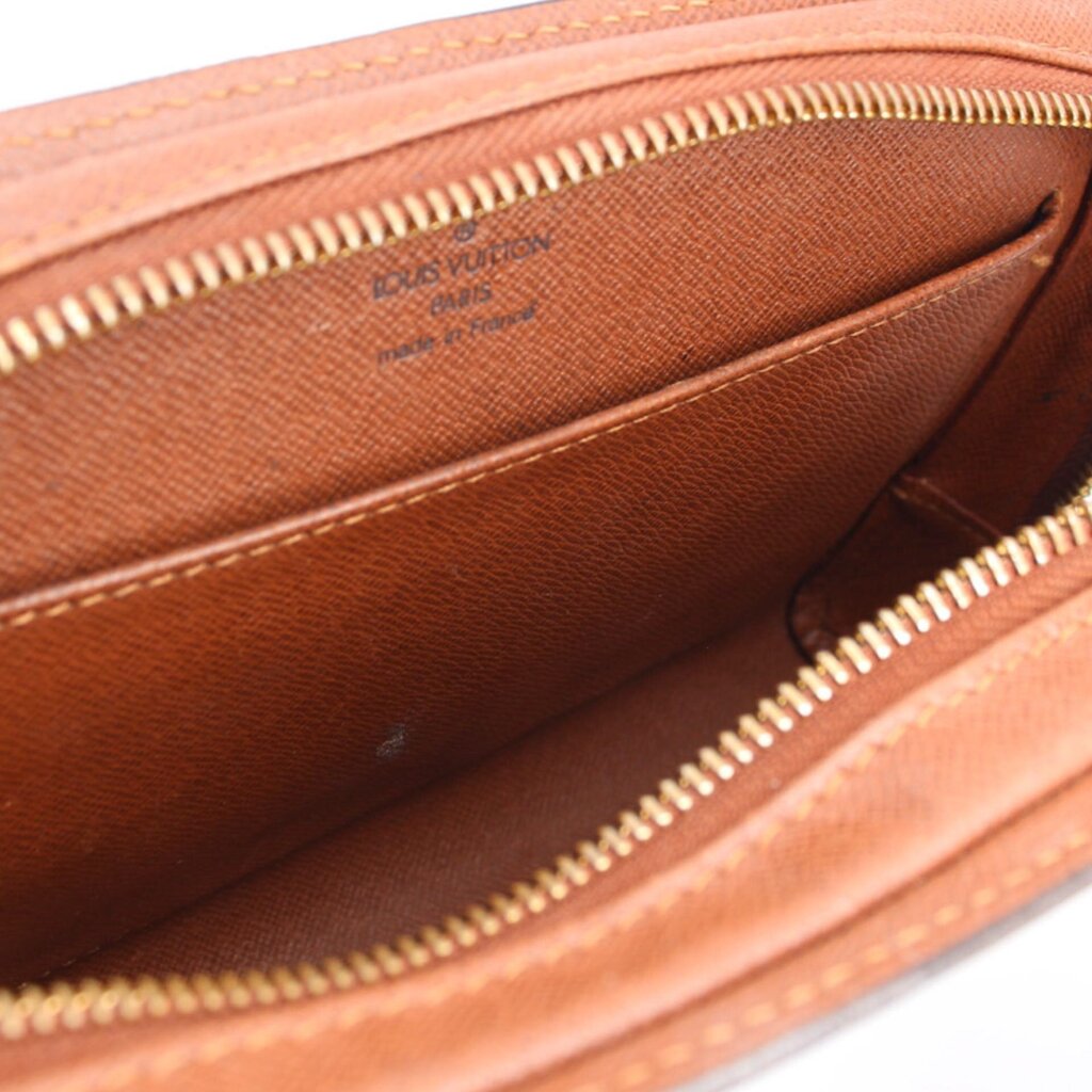 Louis Vuitton monogram Orsay clutch interior with tan lining and double zipper opening