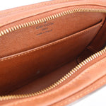 Louis Vuitton monogram Orsay clutch interior with tan lining and double zipper opening