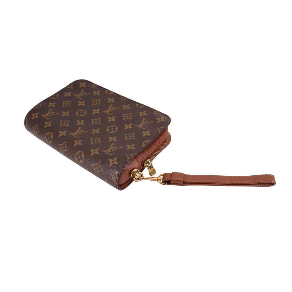 Louis Vuitton monogram canvas wristlet clutch with brown leather strap and zipper