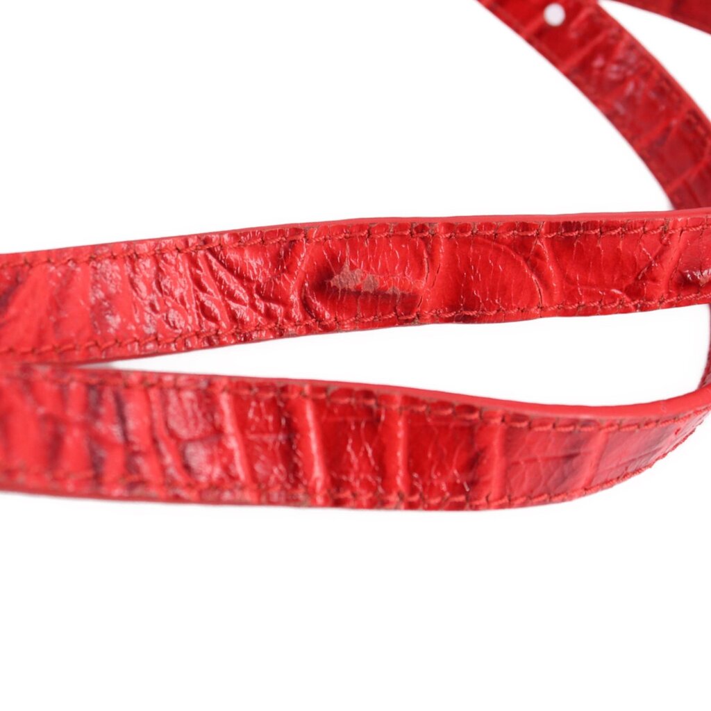 Red croc-embossed shoulder strap with stitched edges