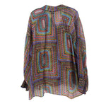 Back of the multicolor printed top, with long sleeves and a loose fit