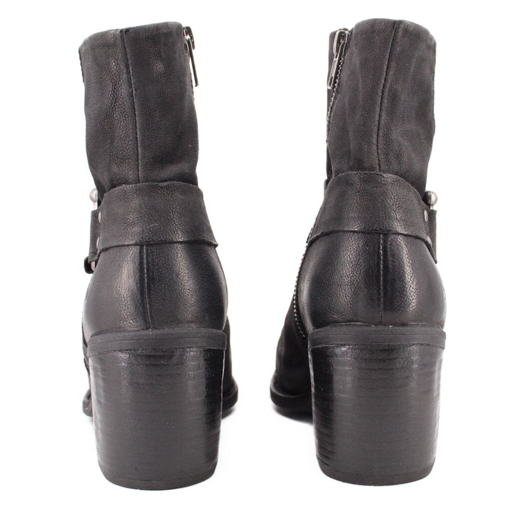 Black leather harness boots, back view with heel and strap hardware