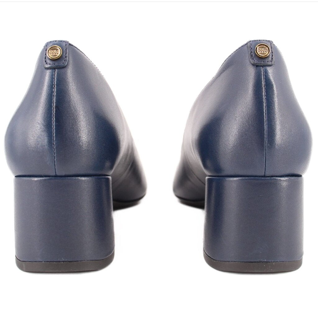 Navy pumps rear view with stitched heel and logo pull tab