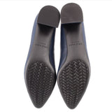 Pair of heels with textured rubber outsoles shown
