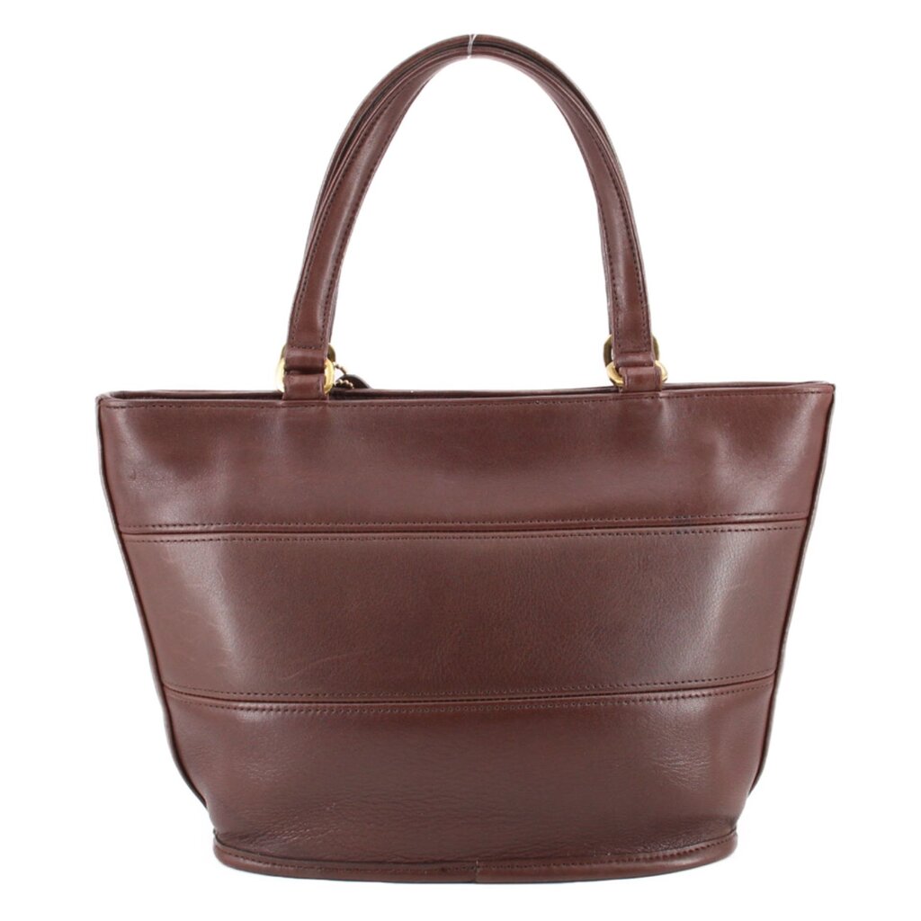 Back of the brown COACH Tribeca shopper bag with twin handles and stitched panels