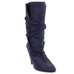 Navy suede slouch boot with wraparound straps, pointed toe, and tapered heel