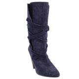 Navy suede slouch boot with wraparound straps, pointed toe, and tapered heel
