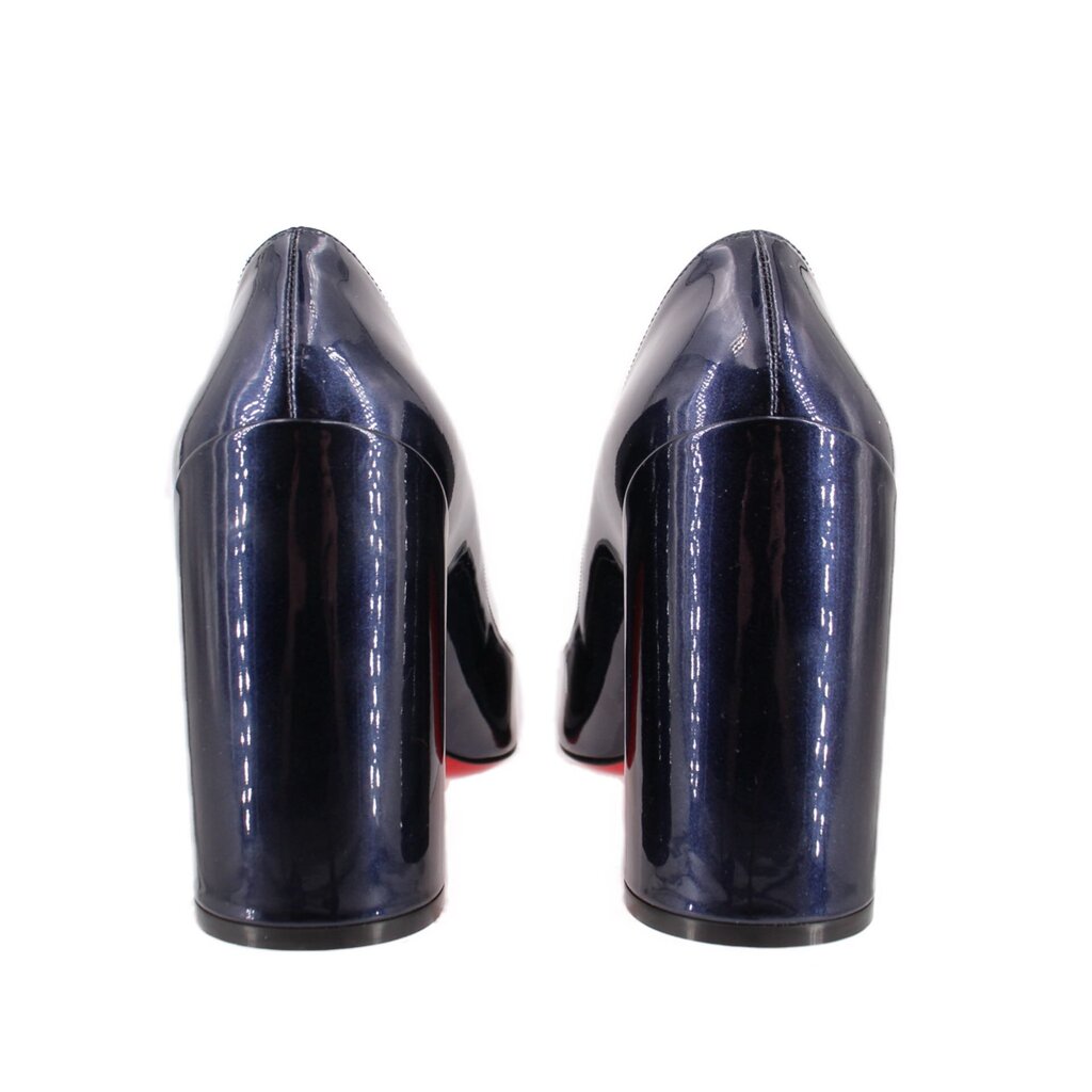 Back view of navy patent leather heels with high block heel and red inner trim