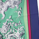 Hermès printed scarf with green, pink, and navy floral pattern