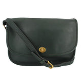 COACH vintage City leather shoulder bag in dark green with a flap and gold-tone turn-lock