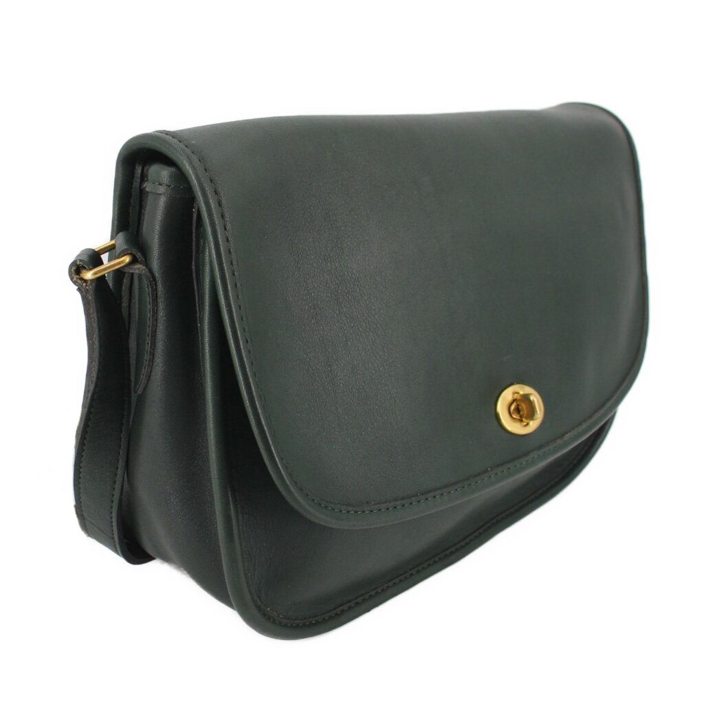 COACH vintage City shoulder bag in dark green, shown from the side with gold-tone hardware
