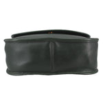 Bottom view of the dark green leather COACH City shoulder bag