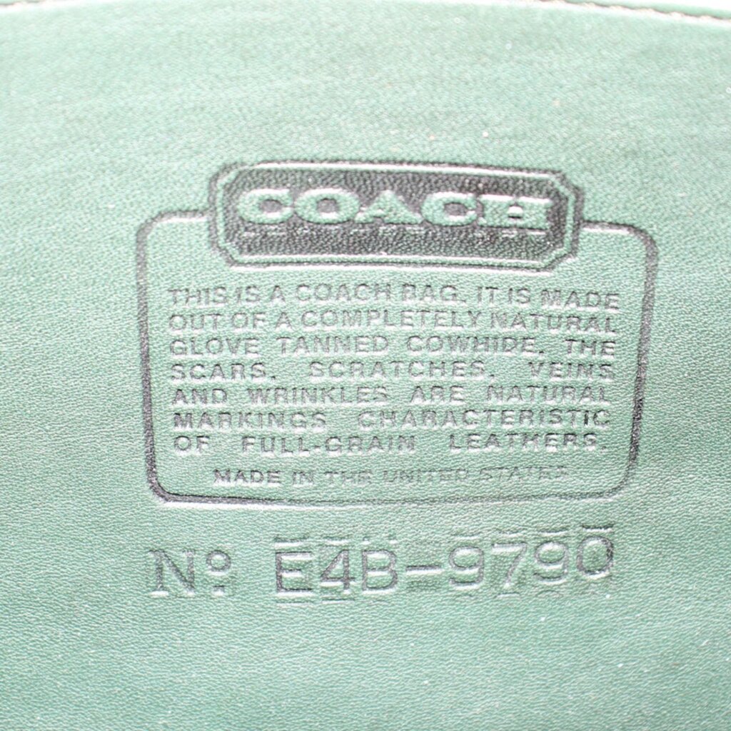 COACH leather stamp and style number inside the dark green shoulder bag