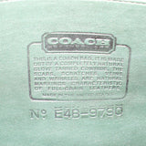 COACH leather stamp and style number inside the dark green shoulder bag