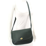 COACH vintage City shoulder bag in bottle green leather, with long strap and rounded flap