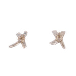 Tiffany & Co. sterling silver stud earrings, shown from the back with butterfly backs