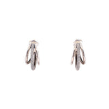 LAGOS Caviar triple hoop sterling silver earrings, shown edge-on with textured center hoops