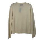 Back of the cream cashmere cardigan, with long sleeves and a plain knit design