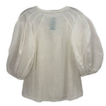 White puff-sleeve top, back view, gathered round neckline and sheer sleeves