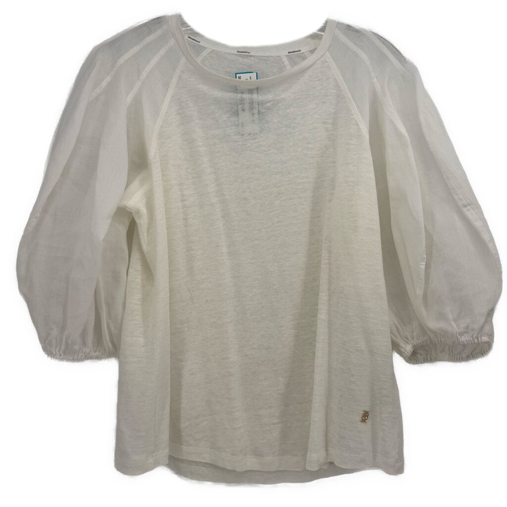 White puff-sleeve top with gathered round neckline and sheer sleeves
