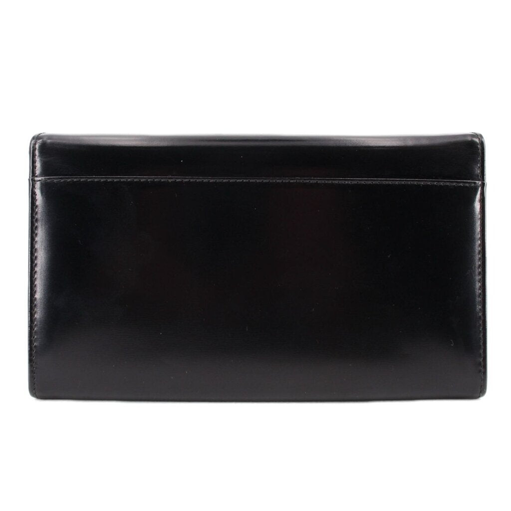 Black leather crossbody bag front view with clean fold-over flap