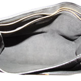 Open LOUIS VUITTON Vavin PM bag showing its dark lined interior and zip pocket