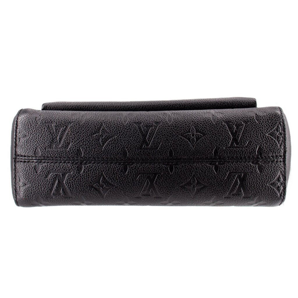 Bottom of the black embossed LOUIS VUITTON Vavin PM bag