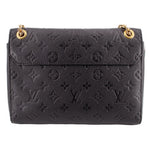Black embossed monogram back of the LOUIS VUITTON Vavin PM bag