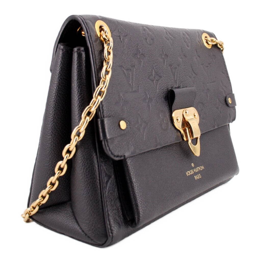 LOUIS VUITTON Vavin PM bag in angled view, showing gusset and gold chain strap