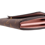 LOUIS VUITTON Sarah wallet, interior close-up with pink lining and monogram edge