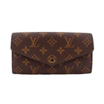 LOUIS VUITTON Sarah wallet, brown monogram canvas, flap with gold snap
