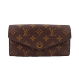 LOUIS VUITTON Sarah wallet, brown monogram canvas, flap with gold snap