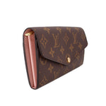 LOUIS VUITTON Sarah wallet, brown monogram with foldover flap and gold clasp