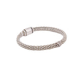 LAGOS sterling silver rope bracelet shown at an angle, with textured beaded strands and clasp