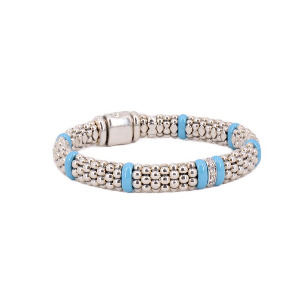 Sterling silver caviar bead bracelet with blue ceramic spacers, shown from another angle