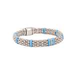 Sterling silver caviar bead bracelet with blue ceramic spacers, shown from another angle