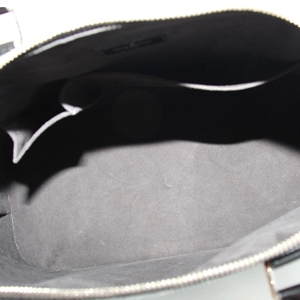 Louis Vuitton Alma GM handbag with open top showing dark lining and interior pocket