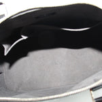 Louis Vuitton Alma GM handbag with open top showing dark lining and interior pocket